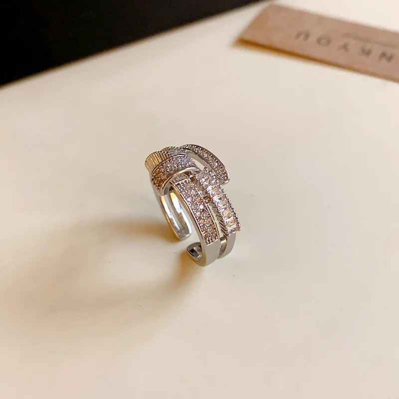 SILVER CROSSOVER CRYSTAL RING